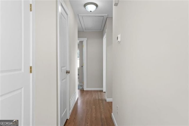 hallway featuring dark hardwood / wood-style floors