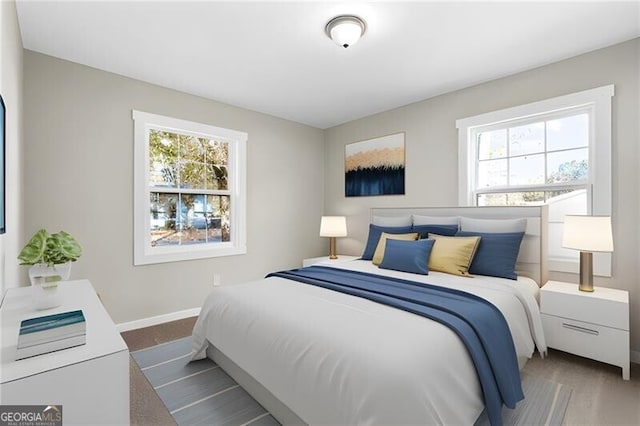 bedroom featuring multiple windows