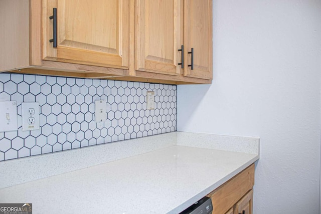 kitchen featuring backsplash