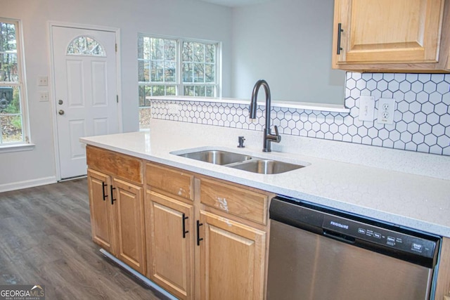 kitchen with dishwasher, sink, tasteful backsplash, light stone counters, and dark hardwood / wood-style flooring