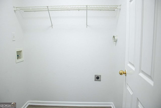 laundry room with electric dryer hookup and washer hookup