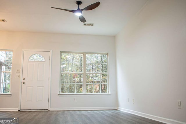 foyer entrance featuring ceiling fan and dark hardwood / wood-style flooring