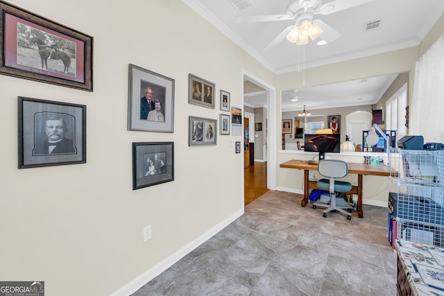 interior space featuring ceiling fan and ornamental molding