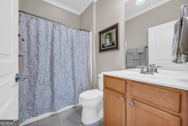 bathroom with tile patterned floors, toilet, vanity, and ornamental molding