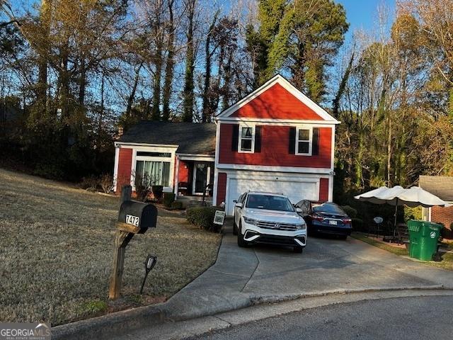 view of front of home with a garage