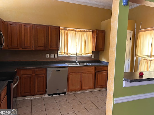 kitchen with dark countertops, brown cabinetry, ornamental molding, and stainless steel appliances