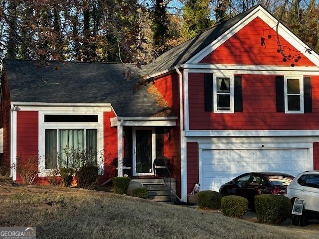 view of front of property with a garage