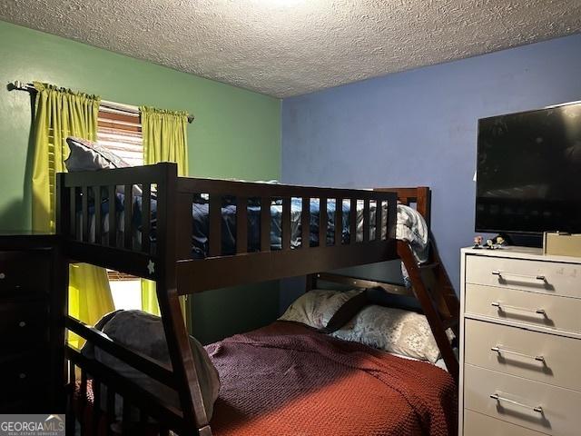 bedroom with a textured ceiling