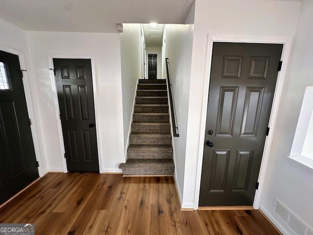 entryway featuring dark hardwood / wood-style flooring