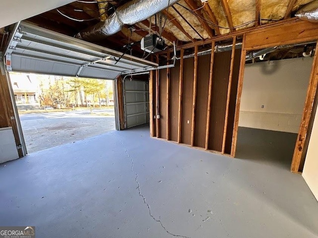 garage featuring a garage door opener