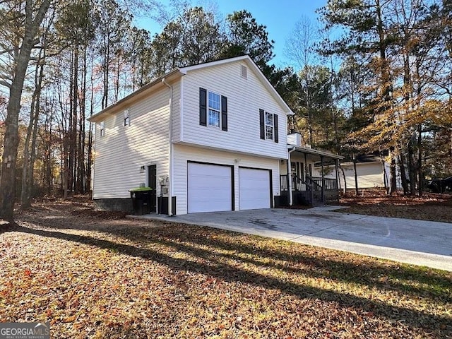 view of side of property featuring a garage