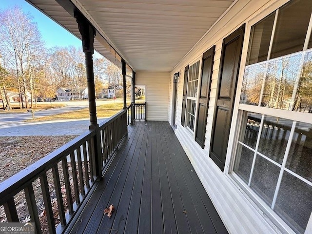 wooden terrace with covered porch