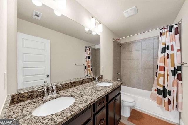 full bathroom with toilet, vanity, shower / tub combo with curtain, and tile patterned flooring