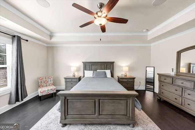 bedroom with crown molding, ceiling fan, and dark wood-type flooring