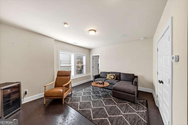 living room featuring dark hardwood / wood-style flooring