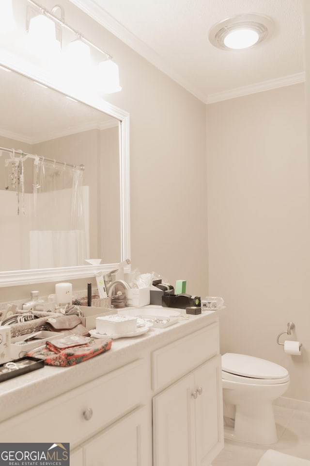 bathroom with vanity, curtained shower, toilet, and crown molding