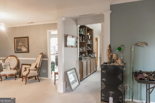 living area with decorative columns, light carpet, and crown molding