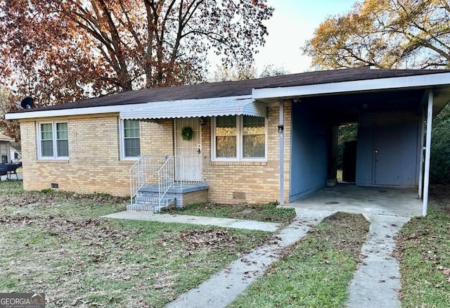 ranch-style home featuring a carport