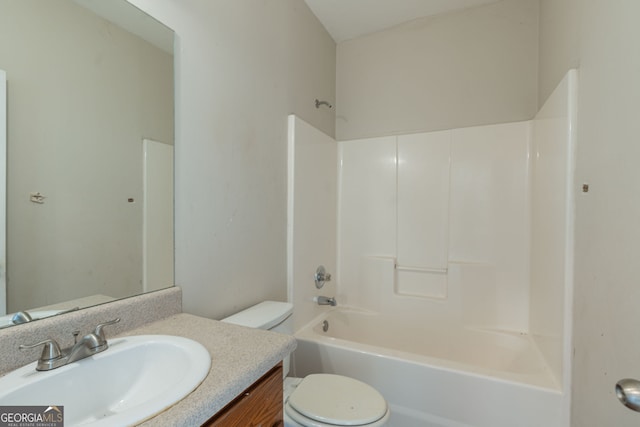 full bathroom with vanity, shower / bath combination, and toilet