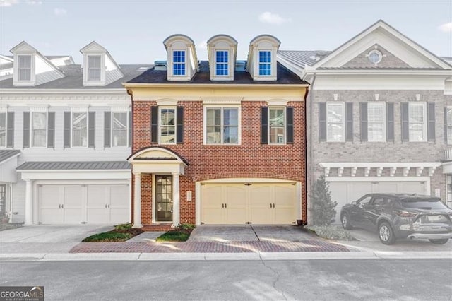 view of front of property featuring a garage