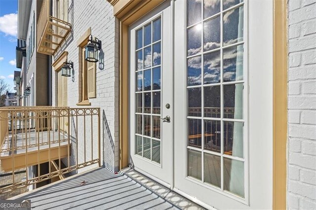 balcony featuring french doors