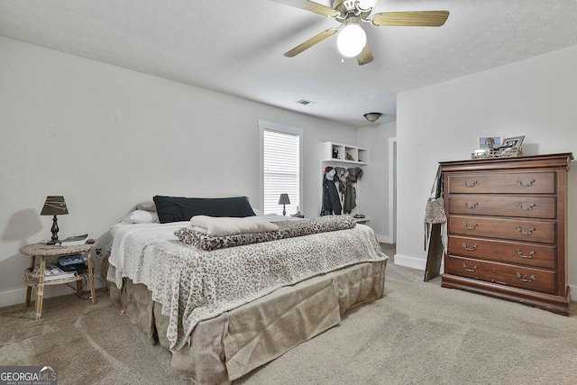 bedroom featuring carpet floors and ceiling fan