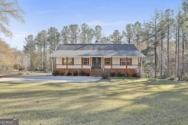 view of front of house with a porch and a front lawn