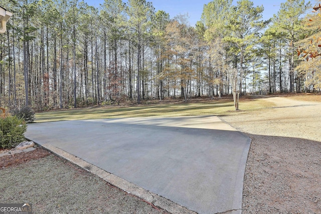 view of yard featuring basketball court