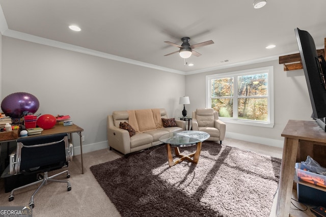 living room with light colored carpet, ceiling fan, and crown molding