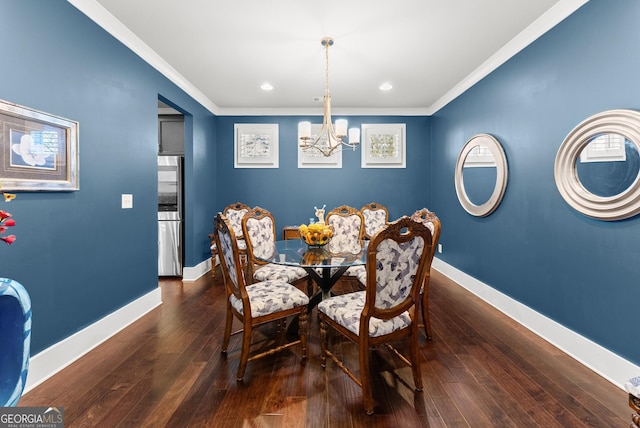 dining area with a notable chandelier, crown molding, and dark wood-type flooring