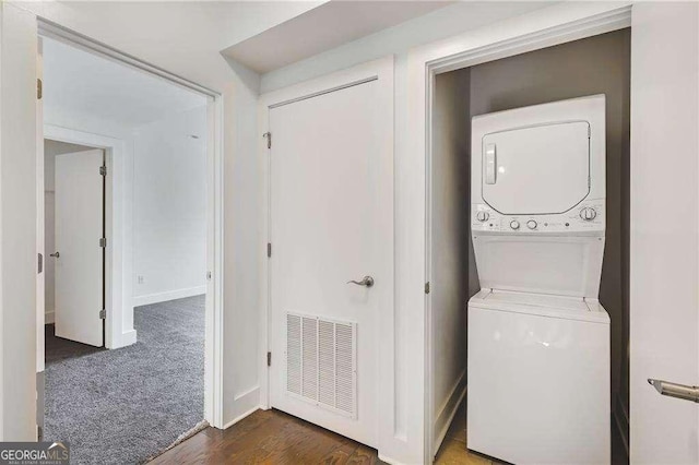 966 Moda Dr, Atlanta, GA 30316 - clothes washing area with stacked washer / drying machine and dark wood-type flooring