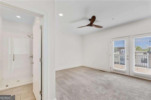 966 Moda Dr, Atlanta, GA 30316 - unfurnished room featuring french doors, light colored carpet, and ceiling fan