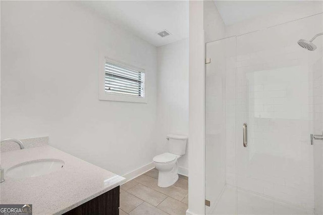 966 Moda Dr, Atlanta, GA 30316 - bathroom featuring tile patterned floors, vanity, toilet, and an enclosed shower