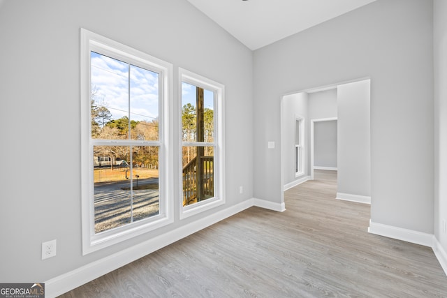 unfurnished room with light hardwood / wood-style flooring