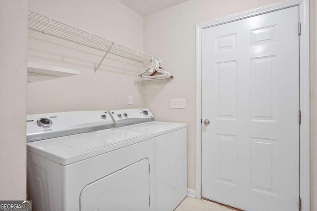 laundry room with washing machine and dryer