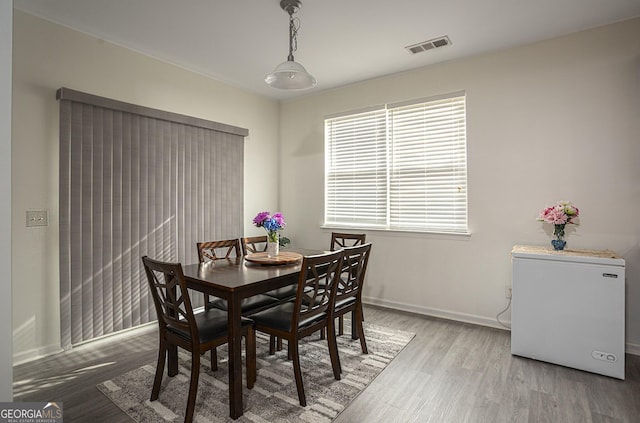 dining room featuring hardwood / wood-style floors