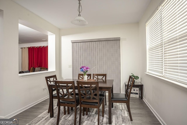 dining area featuring wood-type flooring