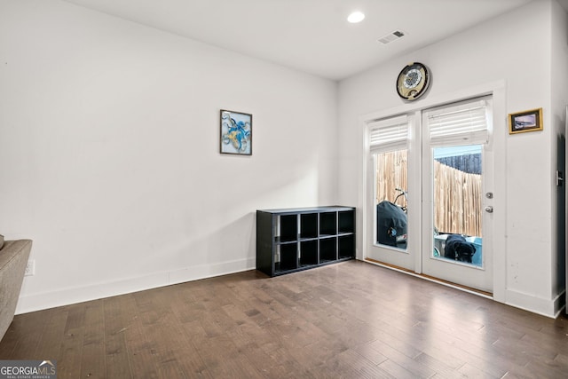 empty room featuring dark hardwood / wood-style floors