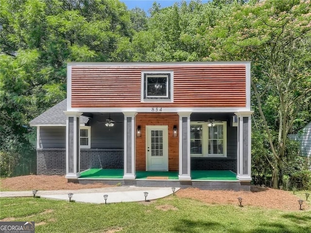 view of front of property featuring covered porch and ceiling fan