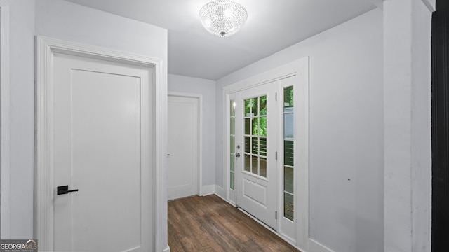 doorway to outside featuring dark hardwood / wood-style flooring