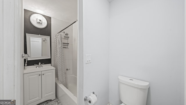 full bathroom featuring shower / tub combo, vanity, and toilet