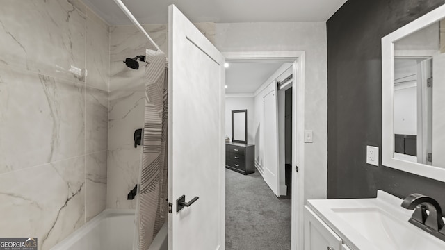 bathroom featuring vanity and shower / bath combo with shower curtain