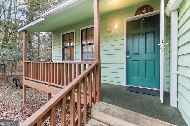 entrance to property with a porch