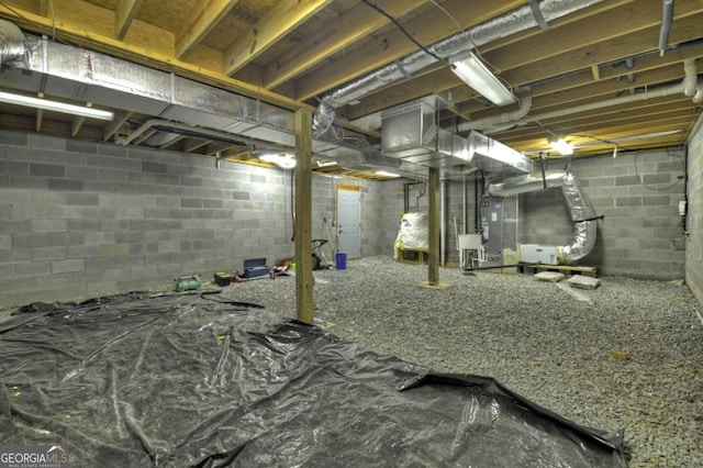 basement featuring heating unit