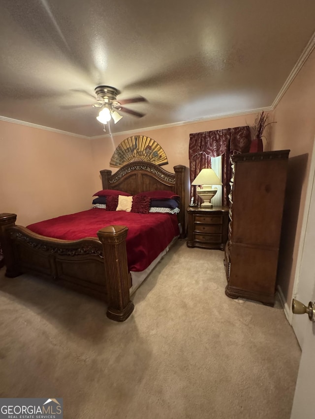 bedroom with light carpet, ceiling fan, and crown molding