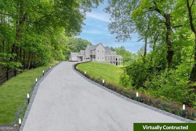 view of front of home with a front lawn