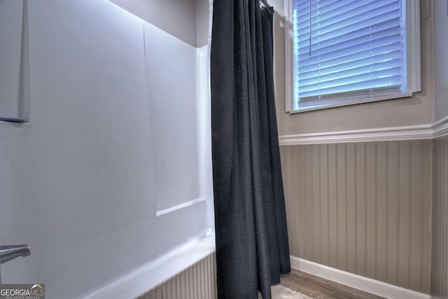 bathroom featuring hardwood / wood-style flooring