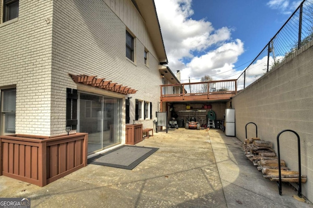 back of property featuring a patio