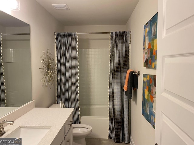 full bathroom featuring tile patterned floors, vanity, shower / bathtub combination with curtain, and toilet