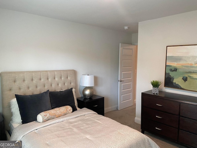 bedroom featuring dark carpet